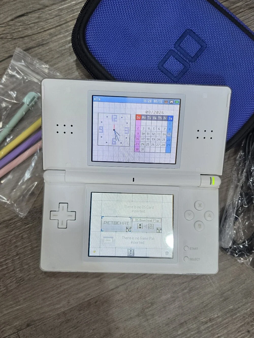 Nintendo DS Lite Handheld Console with Assorted Games - White